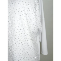 Elegancka bluzka zdobiona gęstą koronką i brokatem - biała